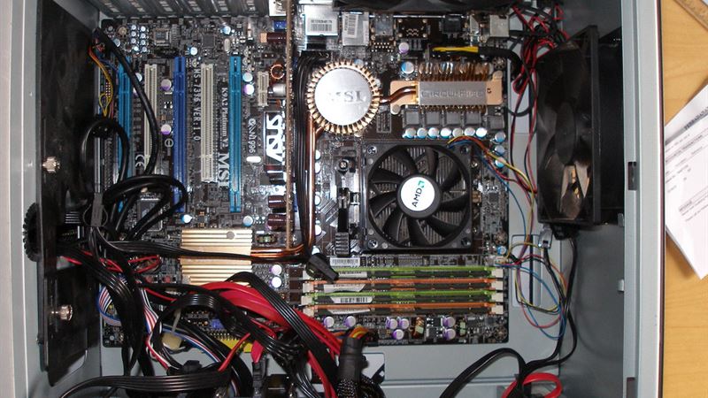 Engineers working in a server room
