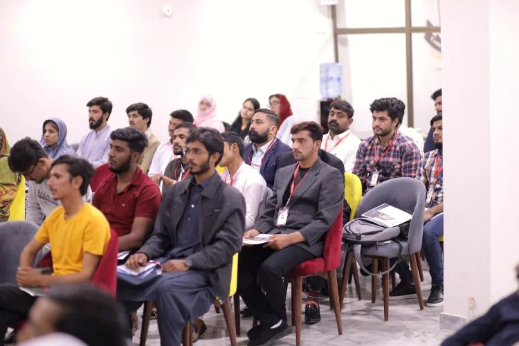 Students seated in the CAS auditorium during an event