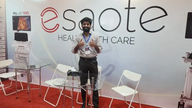 Talha presenting at the Esaote stand